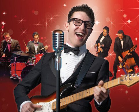 A composite image of Buddy Holly and The Cricketers, comprising five white males in black suits with white shirts and bow ties performing on keys, drums, guitars and double bass. The performer in the centre has Buddy Holly's trademark glasses and hair style and is singing into a 1950s style microphone.